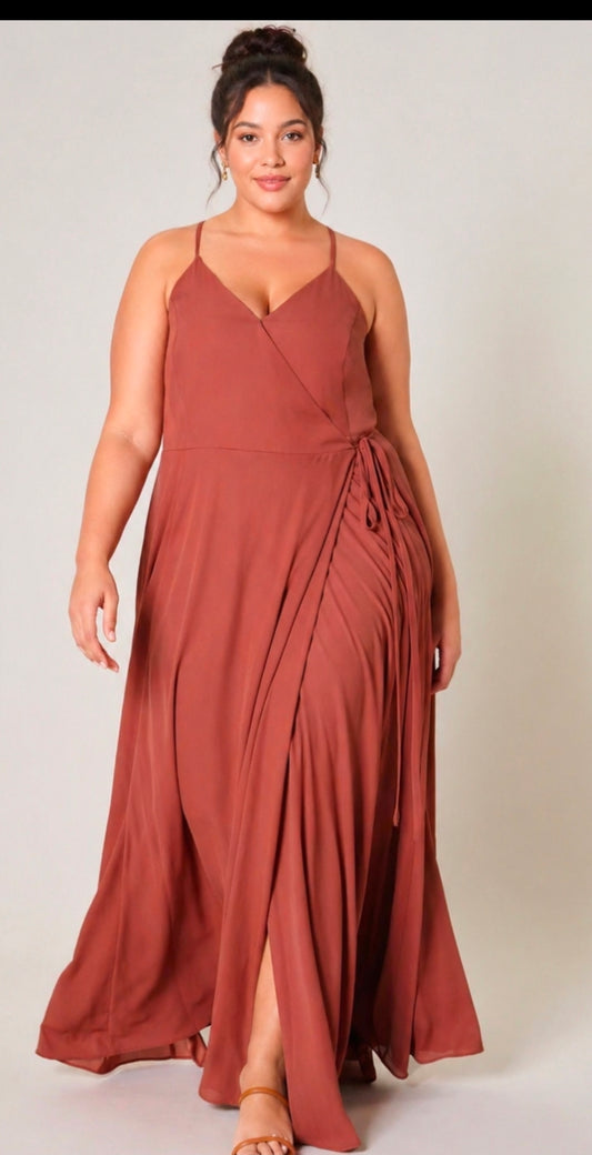 This plus size sleeveless surplice open back maxi dress.